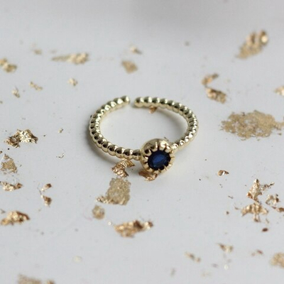 Д074-сз Кольцо с круглым фианитом синего цвета, позолота