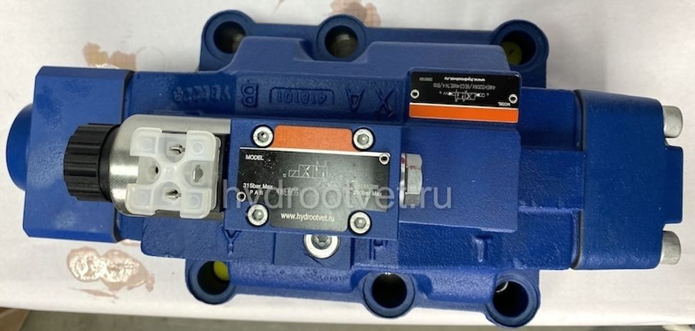 4WEH32HD6X/6EG24N9ETK4/B10 - Гидрораспределитель с электроуправлением Ду32 схема D (574А), напряжение G24, каналы управления ET - X и Y - внутренние