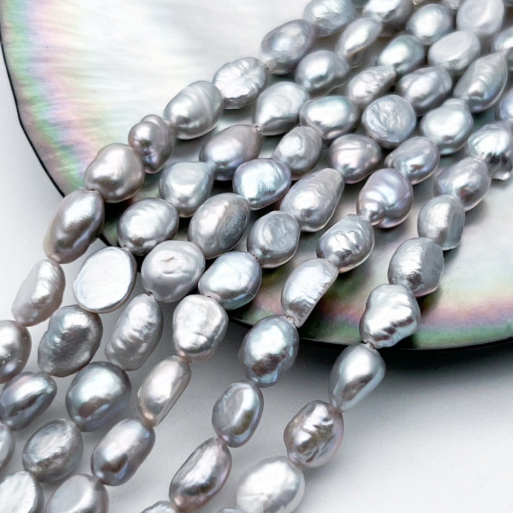 Жемчуг бусины, цвет серый, размер около 6,8-8*6-6,5 мм, цена за отрезок 17 см (1/2 нити)