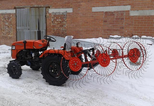 Грабли-ворошилки колёсно-пальцевые двухкрылые