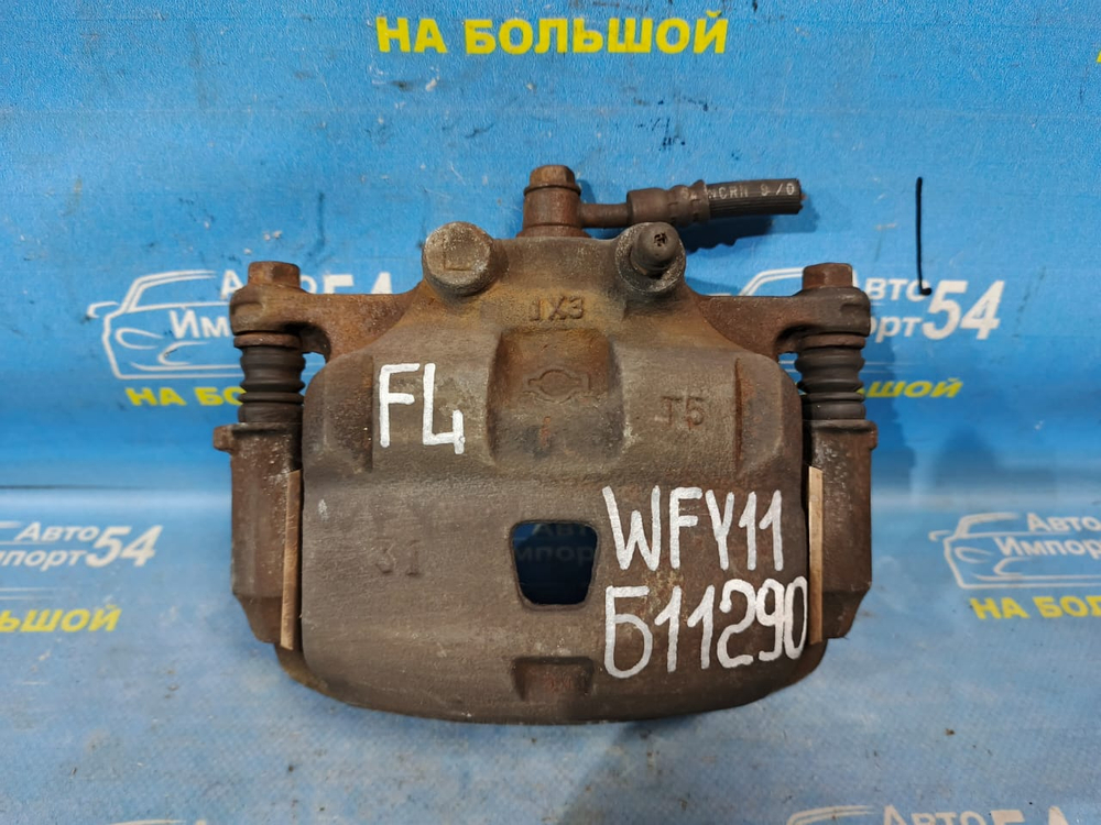 Суппорт тормозной передний левый NISSAN WINGROAD 1999-2005