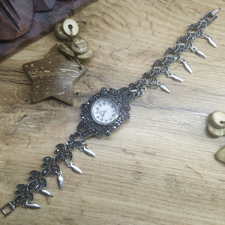 Часы Vogue Лотос Бантик циферблат белый в узорах стразы графитовые металл серебристый