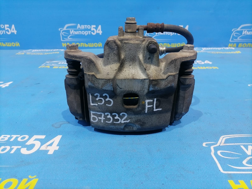 Суппорт тормозной передний левый NISSAN TEANA 2014–2020