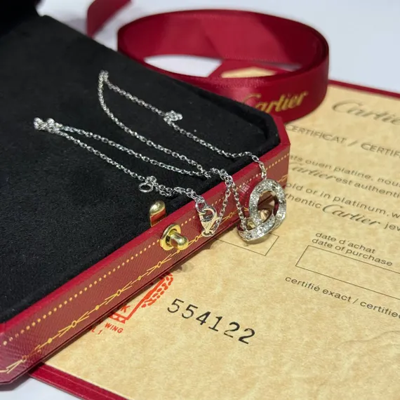 Колье Cartier Interlocking Love