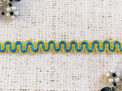 Тесьма вязаная отделочная с люрексом, ш. 1 см.