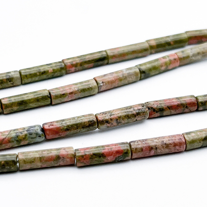 Унакит бусины, размер около 13,5*4 мм, цена за 13 шт (1/2 нити)