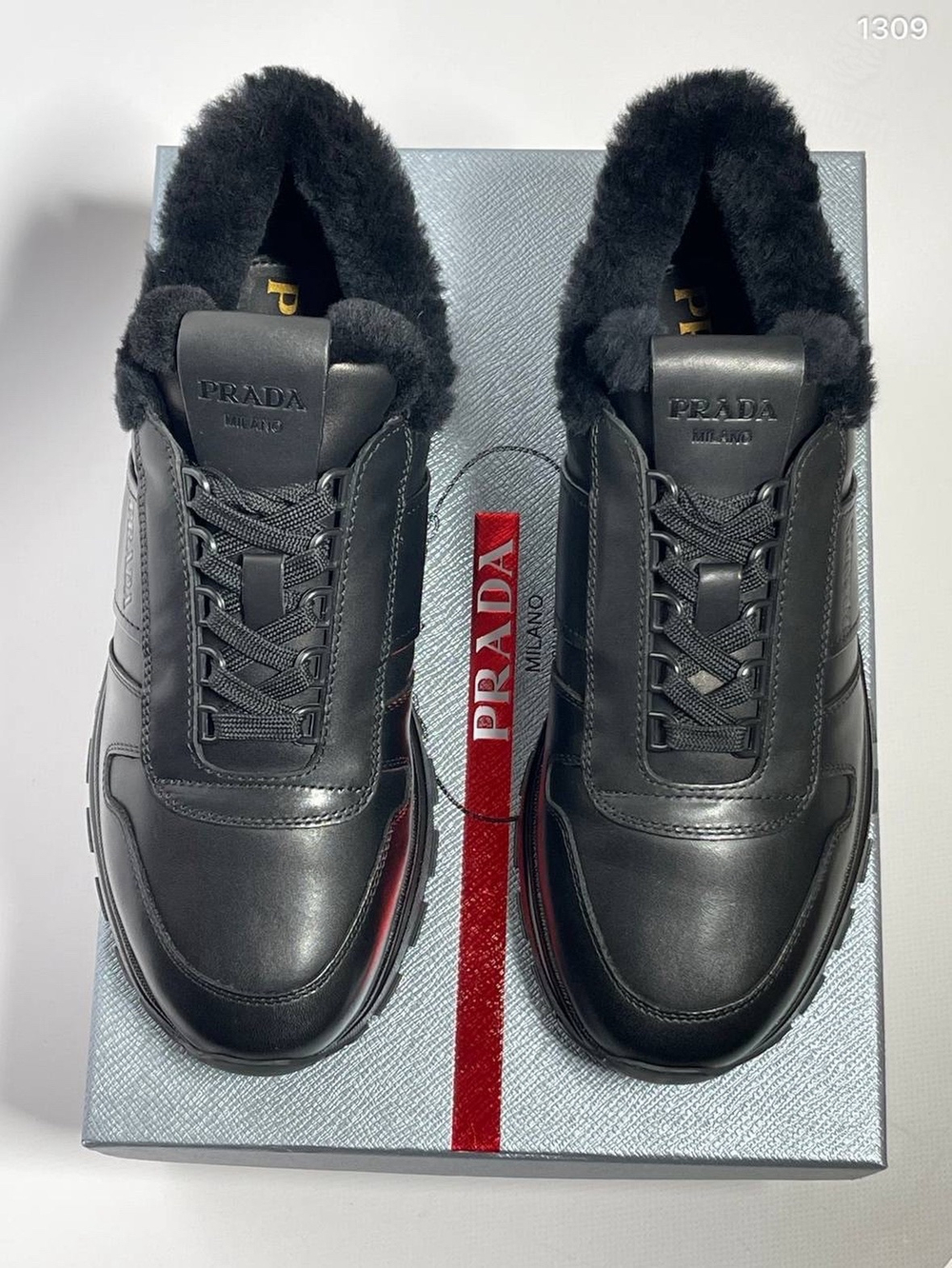 Кроссовки Prada