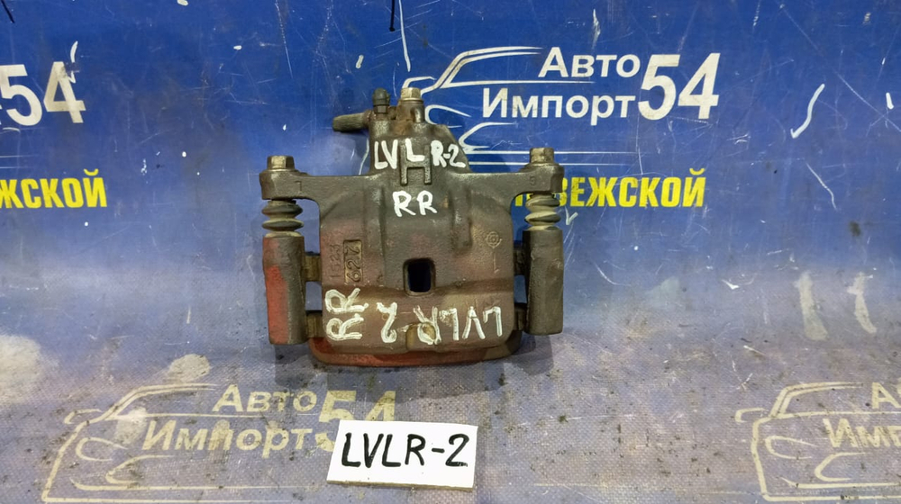 Суппорт тормозной задний правый MAZDA MPV 1996