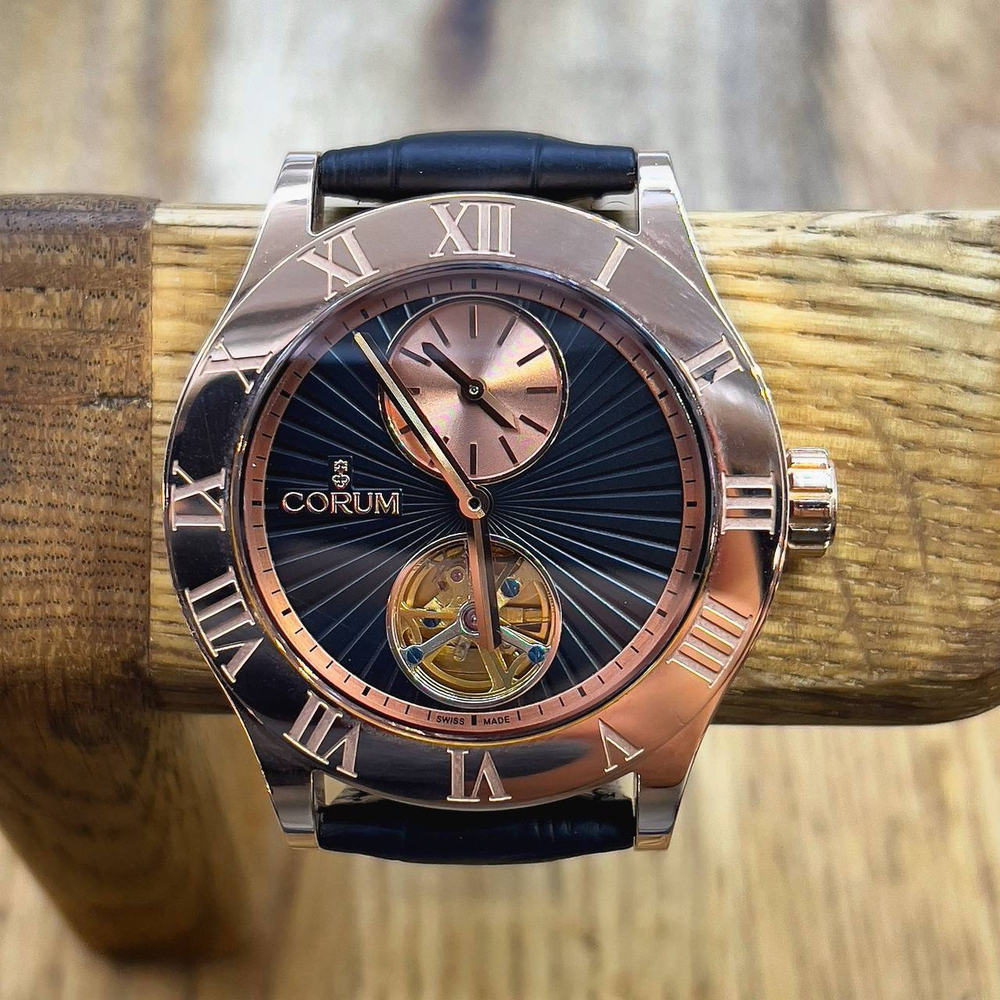 Часы Corum