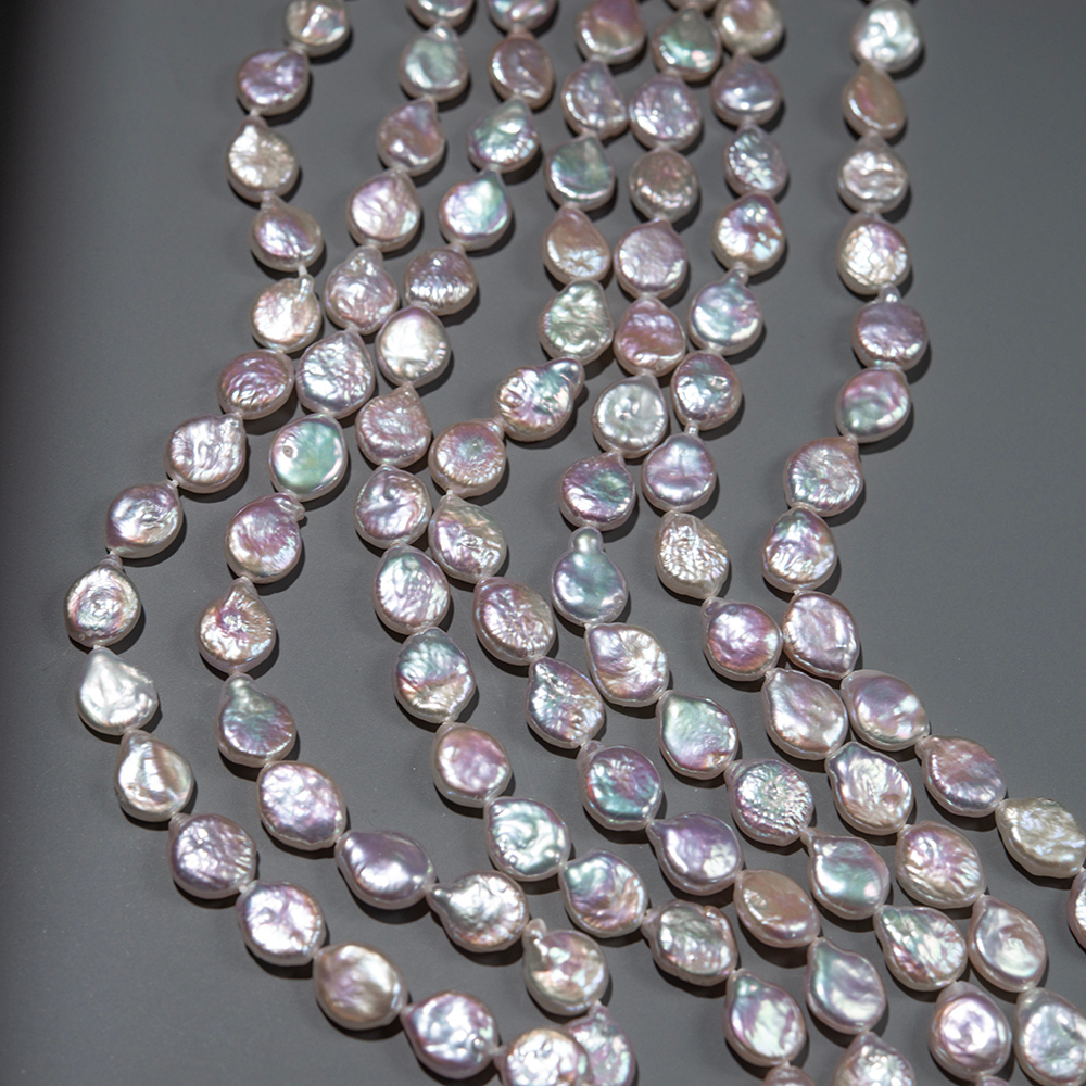 Жемчуг культивированный каплевидный с ярким розово-лиловым свечением, 10*9мм