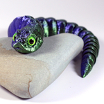 Гибкая игрушка-антистресс, змея с глазами, 27 см., зеленая с синим