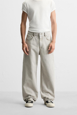 Джинсы baggy fit с асимметричными швами