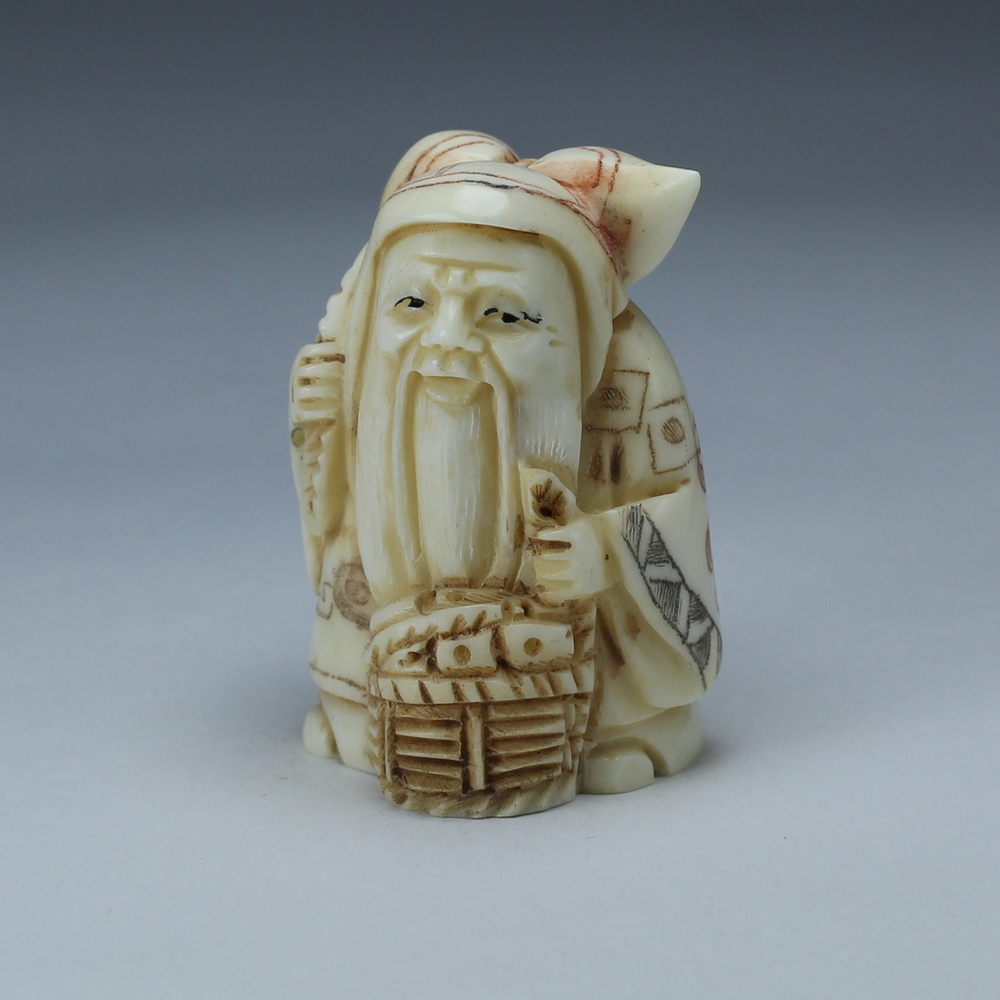 Нэцкэ Фукурокудзю с тыквой горлянкой и корзиной рыбы