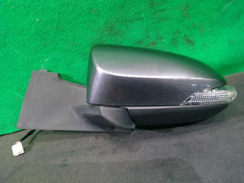 зеркало левое Toyota Vitz NCP130