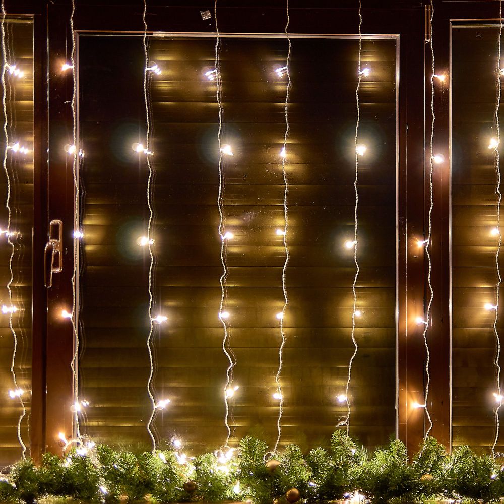 ULD-C3030-192-DTA WARM WHITE IP20 Занавес светодиодный. 3х3м. 192 светодиода. Теплый белый свет. Провод прозрачный. TM Uniel