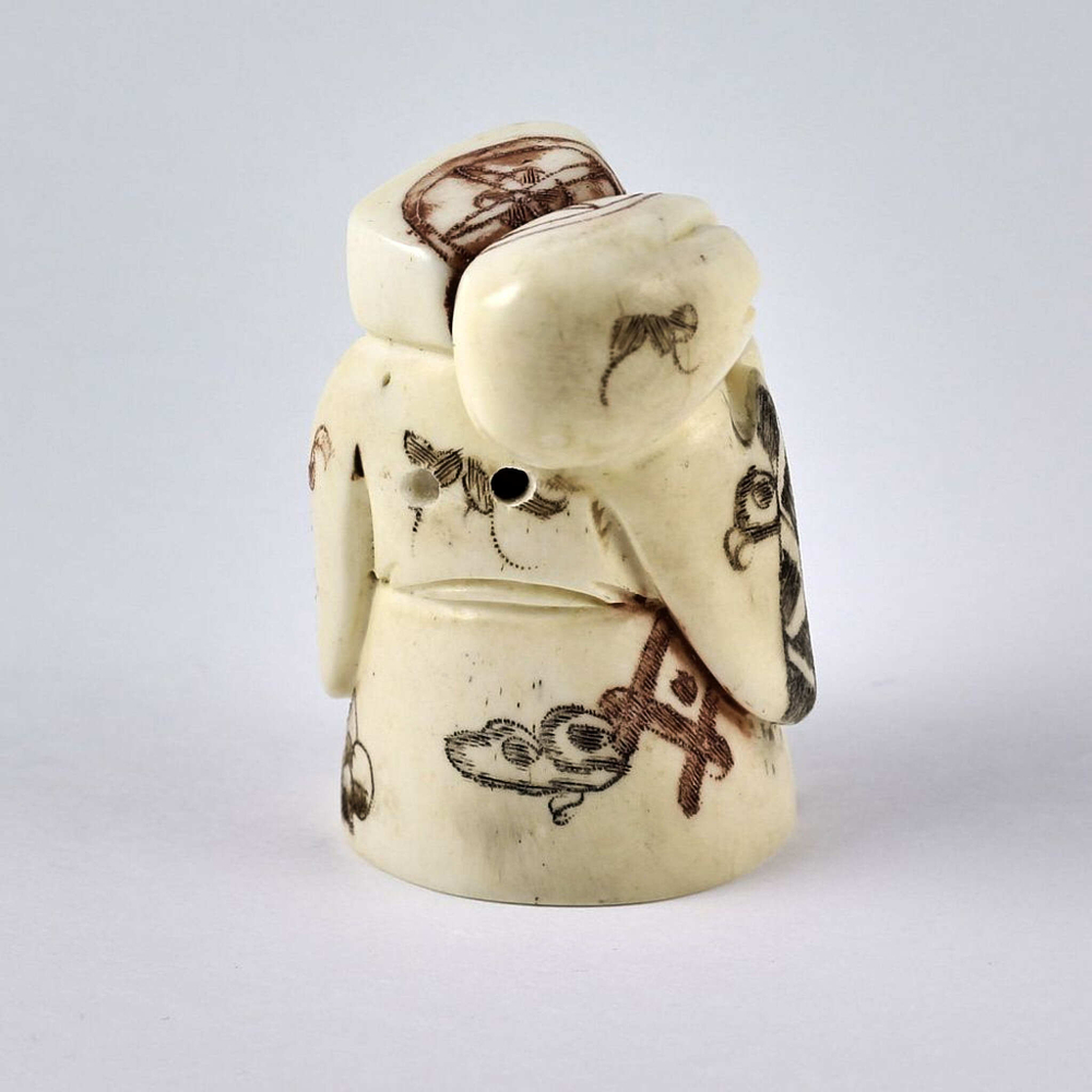 Нэцкэ Дзюродзин с мешком риса