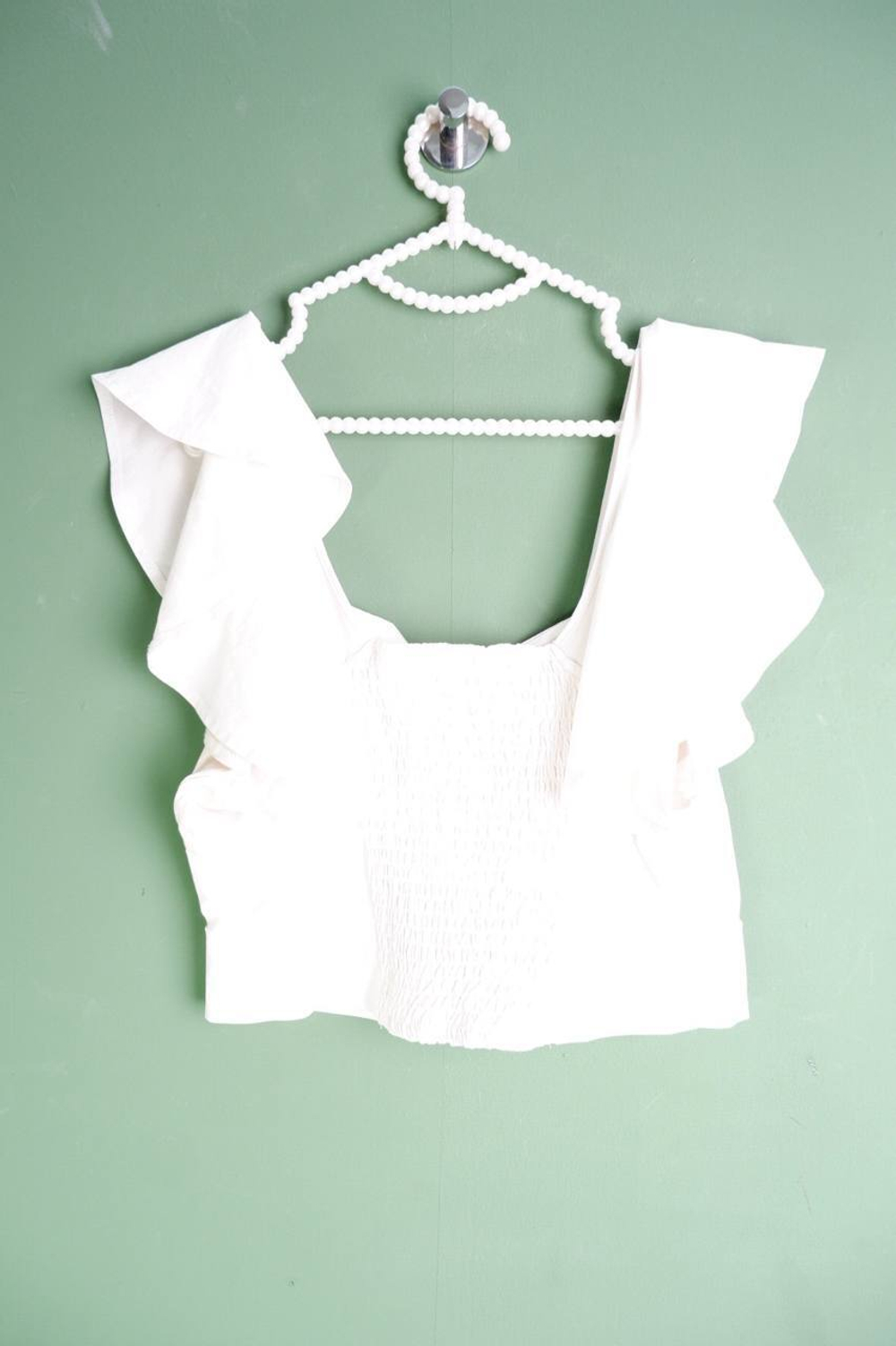 Топ Reserved для романтичного акцента, маркировка L, визуально на 48 размер