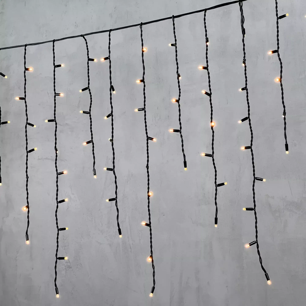 Светодиодная бахрома с колпачком 3,2*0,9 м., 168 экстра теплых белых LED ламп, каучуковый черный провод, LTC (LL168-1-2EWW)