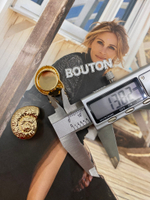 Накладка на пуговицу золотистая в форме рельефной ракушки