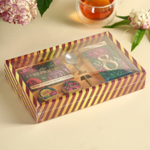 Подарочный набор «Ты совершенна»: крем-мёд с клубникой и хлопком 30 г × 2 шт., арахис в шоколадной глазури 70 г, чай чёрный с тропическими фруктами 50 г, ложка