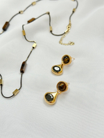 Колье золотые цилиндры и агаты на тонкой черно-золотой цепочке