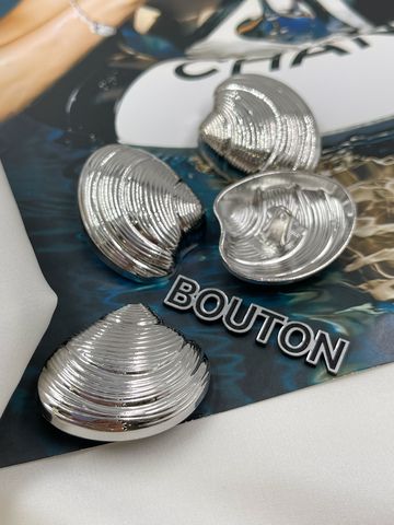 Пуговицы в форме ракушки серебристые