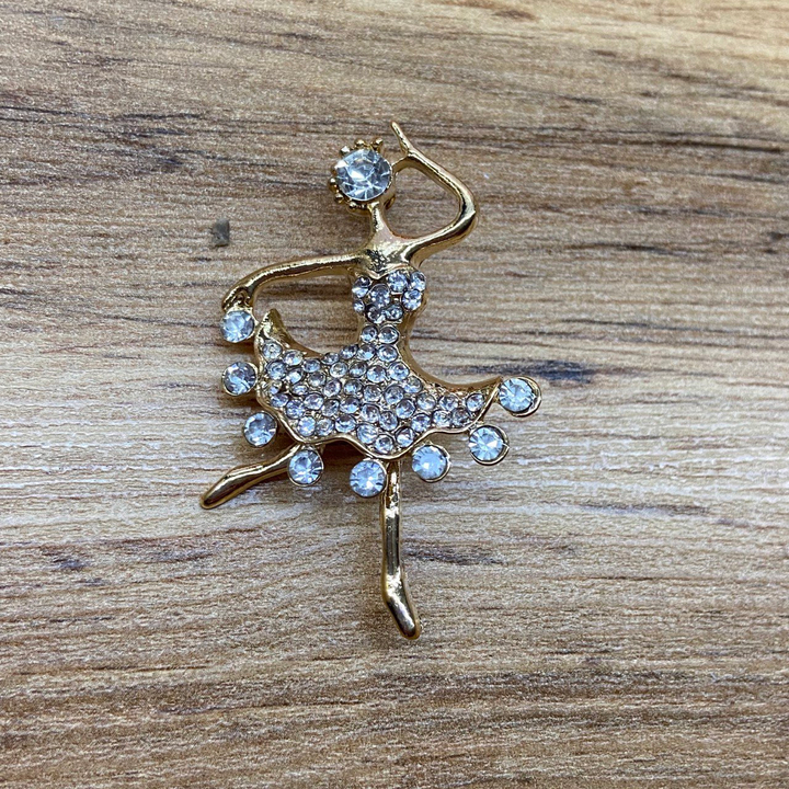 Брошь Балерина в танце 8 кристаллов на подоле платья стразы металл золотистый