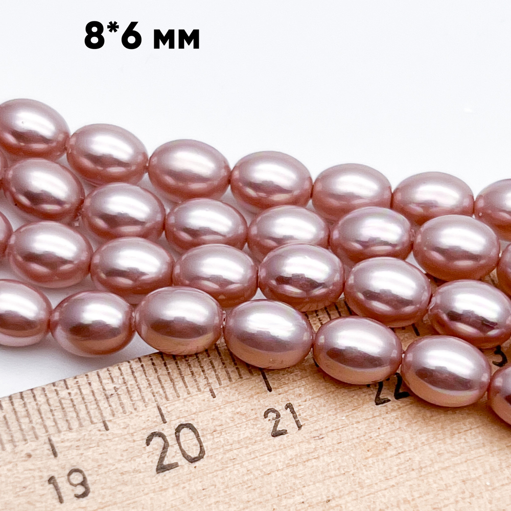 "Майорка" рис, цвет розовый, размер около 8*6 мм, цена за 24-25 шт (1/2 нити)