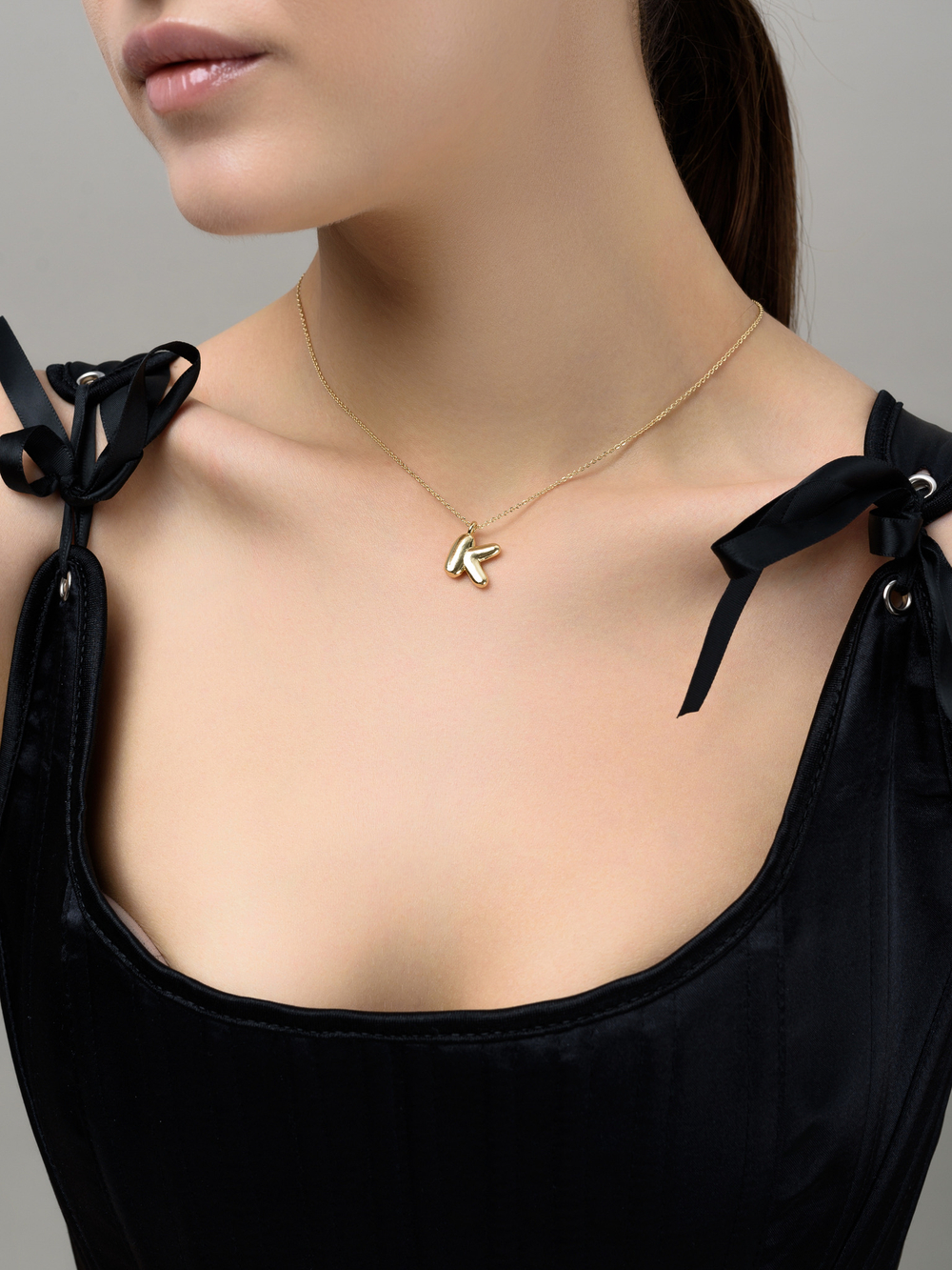 Колье с буквой К