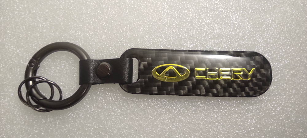 Брелок "Chery" карбон, золотой (1 шт.)