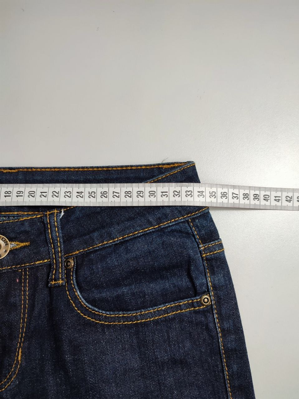 Джинсы темные 42 размер
