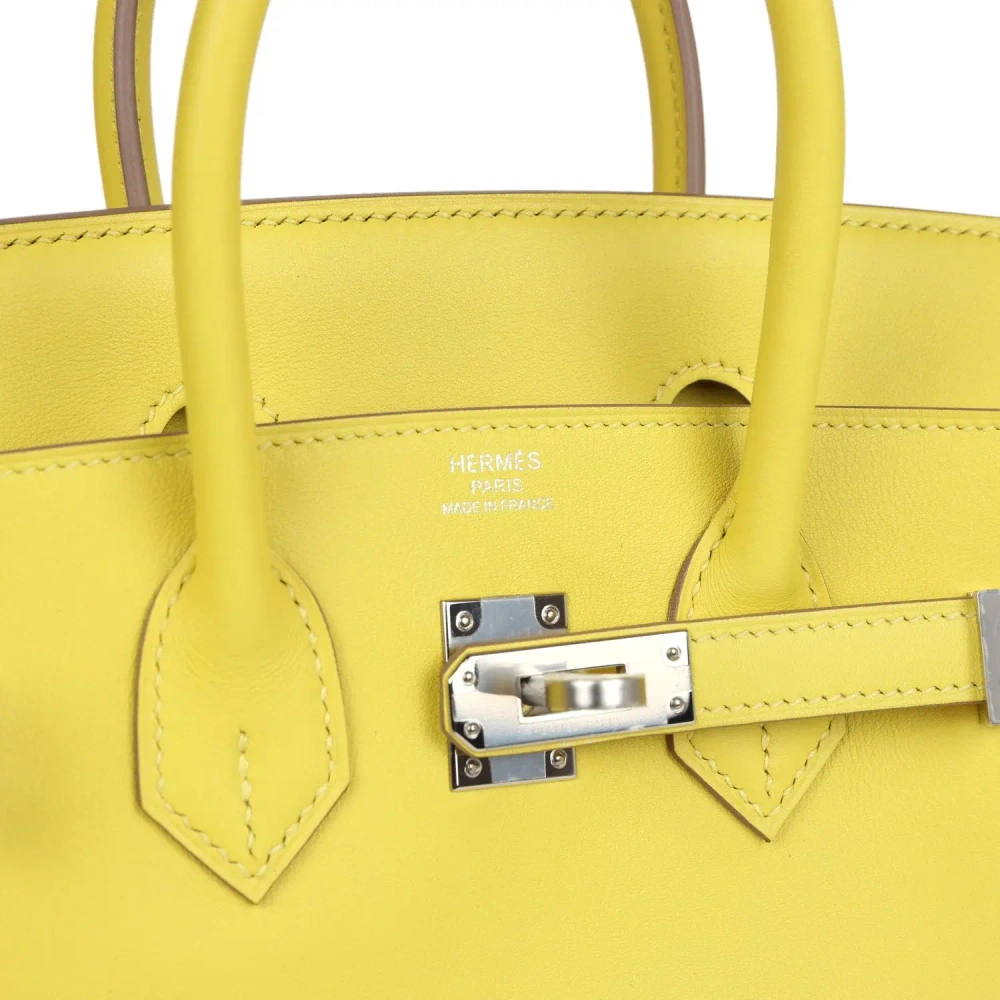 Сумка из кожи питона с аксессуарами Hermès