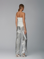 Женские кожаные брюки серебряные широкого кроя