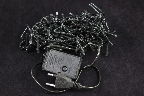 Светодиодная нить 7 м., 220V, 100 холодных белых LED ламп, контроллер, черный провод, Winner Light (w.01.5B.100-)