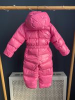 Пуховой комбинезон Moncler