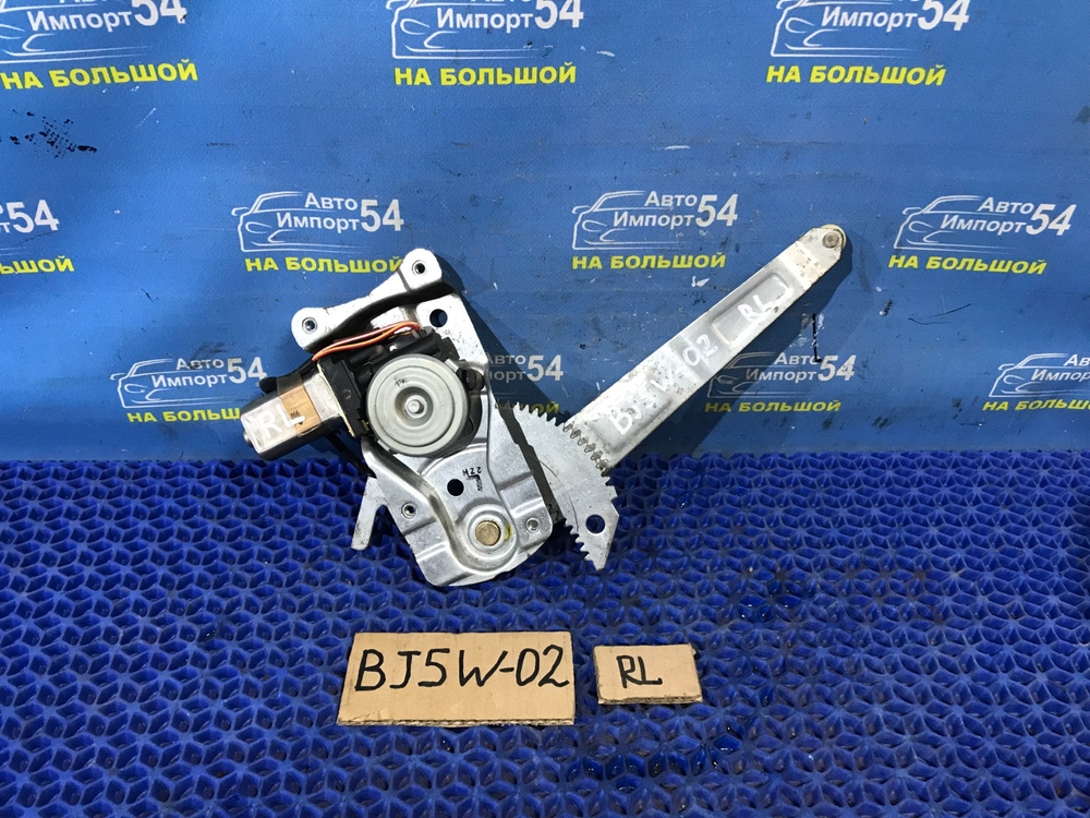 Стеклоподъемник задний левый MAZDA FAMILIA 2001