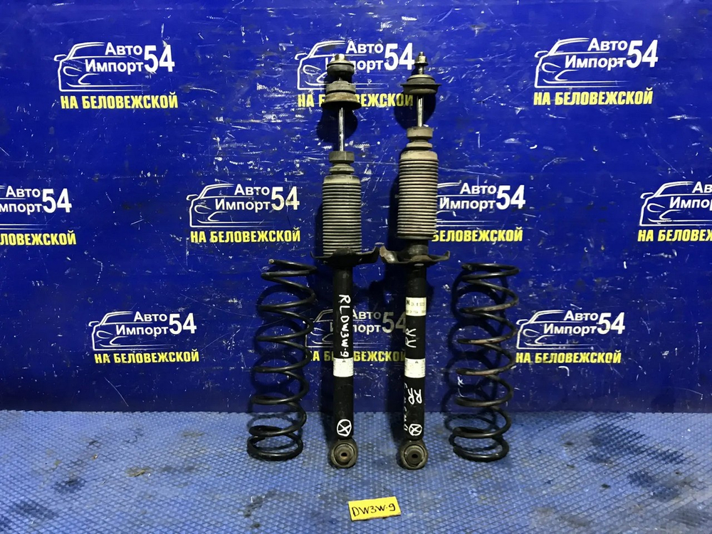 Стойка задняя левая MAZDA DEMIO 2000