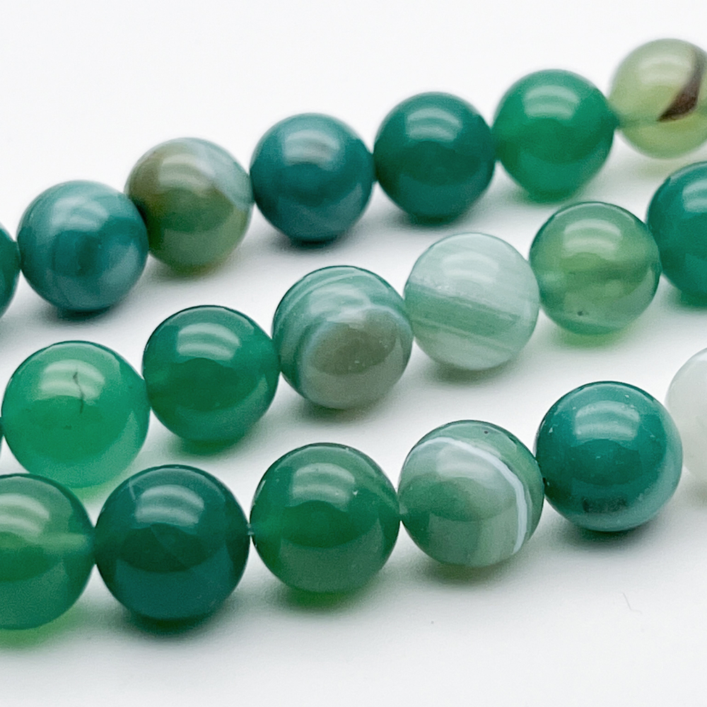 Агат тонированный зеленый бусины, диаметр 10,2-10,3 мм, цена за 18-19 шт (1/2 нити)