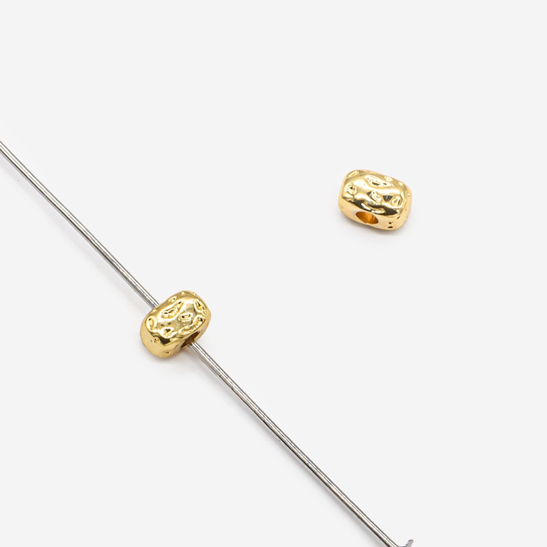 Бусина-разделитель в форме камушка 3,7*5,7мм, позолота