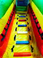 Коммерческий надувной батут "Джунгли" с горкой, 9*6*4.5 м