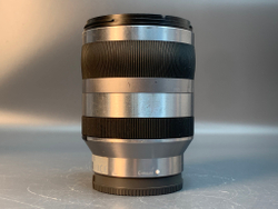 Sony 18-200mm OSS , сколы на пластмассе передней линзы