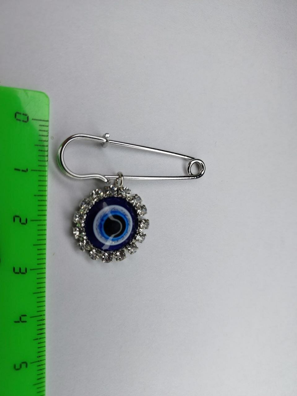 Брошь-булавка "Глаз Фатимы". цвет " Серебро"