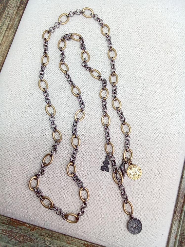 Цепь-трансформер длинная: овальные и рифленые золотые кольца, с горным хрусталем