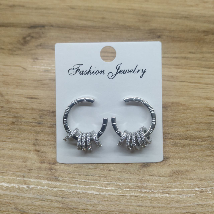 Серьги-гвоздики Время полукольца 5 подвижных колец стразы металл серебристый