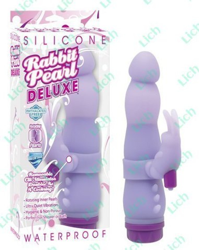 Сиреневый водонепроницаемый ротатор со съёмным вибростимулятором клитора.