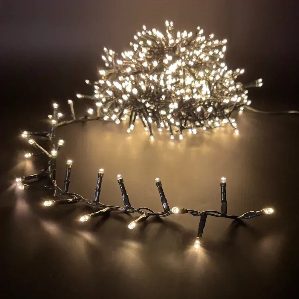 Светодиодная нить Snake Light 2000 теплых ламп, 40 м., 24В, 8 режимов, зеленый провод, для елки 260-300 см., Christmas DeLuxe (85745)