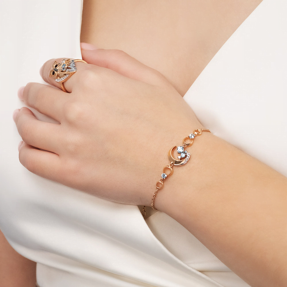 Браслет «Загадочность» из комбинированного золота с топазами и натуральными топазами white