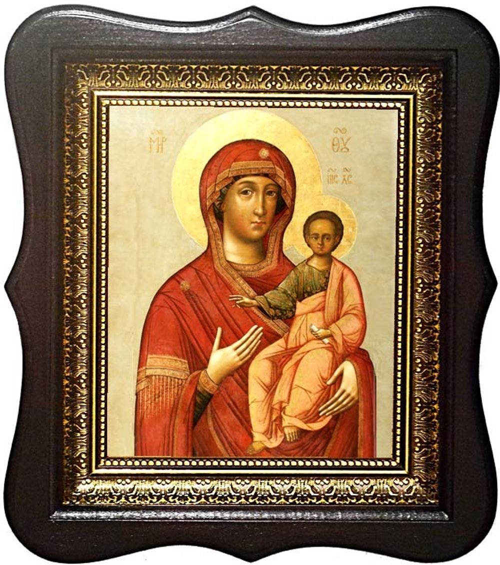 Смоленская икона Божьей Матери на холсте в киоте.