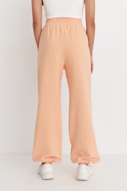 Джоггеры оверсайз из рифленого хлопка цвета персик