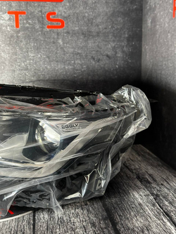 Фара левая Geely Coolray 7051022900